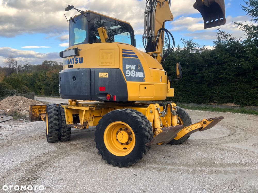 Komatsu Koparka kołowa KOMATSU 10ton PW98MR-8 4x4x4 plug podpory KLIMA 30km/h ramie Long 3xłamane skrętne 2012r bez DPF i ADBLUE 4cyl dodatk wyjścia hydr 51Kw 2osie skrętne pług stopy Cat TEREX Liebherr Wacker Pw 98 mr 8 11 prosto z importu - 2