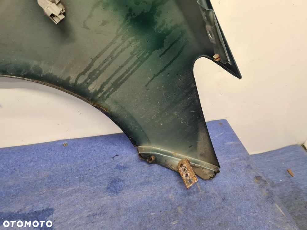 TOYOTA YARIS II LIFT BŁOTNIK PRZÓD LEWY 6S3 - 9