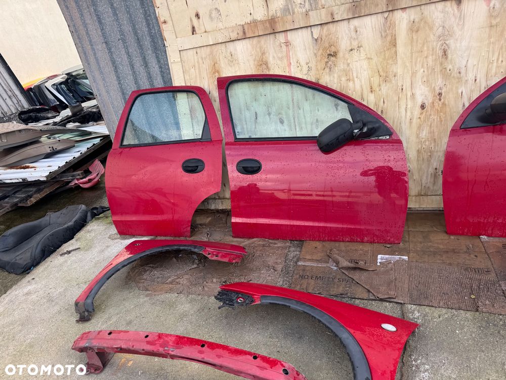 Opel Corsa c czerwone bordowe drzwi przednie przód prawe lewe maska lampy przód przednie lampy tył tylnie maska błotnik prawy lewe lampy tył belka przód - 3
