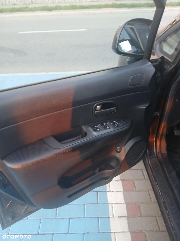 Kia Carens 2.0 CVVT Spirit - 3