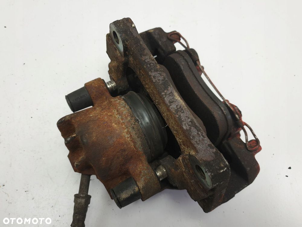 Volvo S80 2.8 T6 LEWY PRZEDNI ZACISK HAMULCOWY - 7