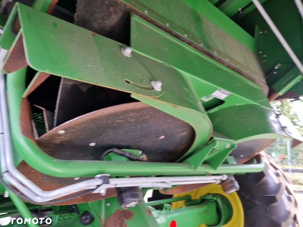 John Deere T660I - 11