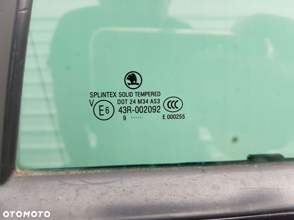 SKODA OCTAVIA 2 II LIFT 08-12r KOMBI DRZWI LEWE TYŁ 9910 - 4