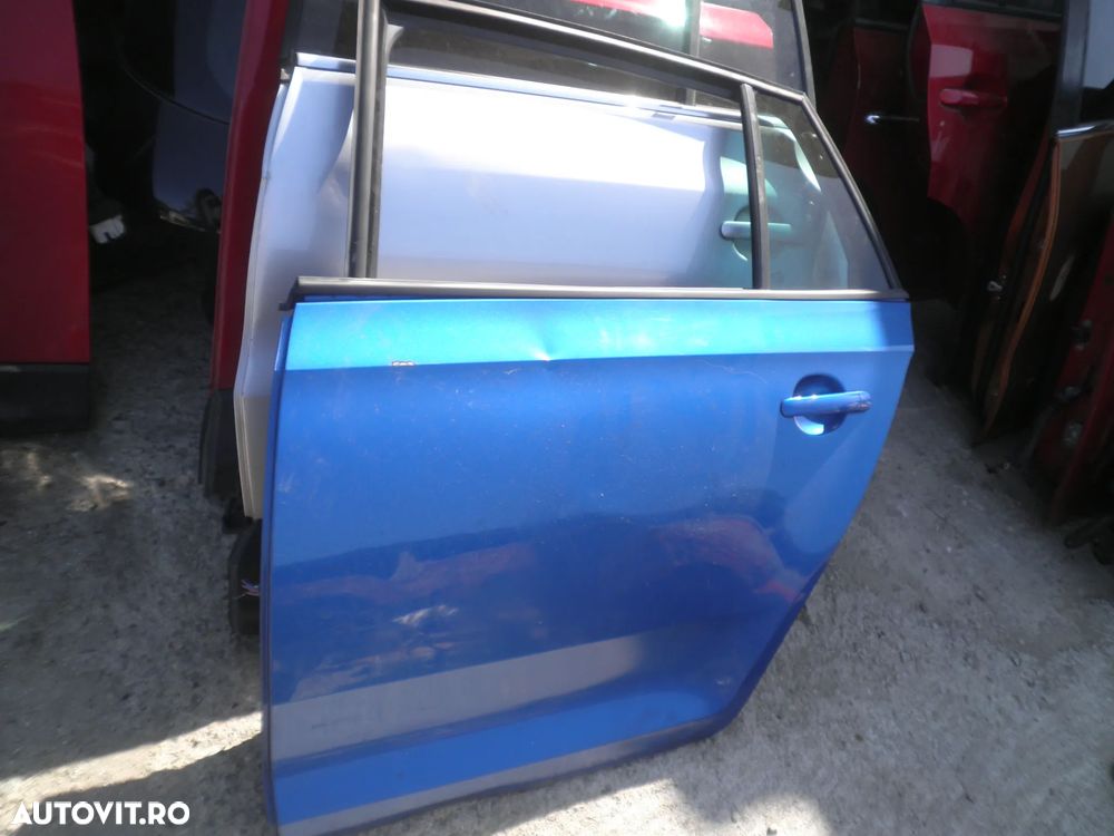 Usa stanga spate Skoda Rapid ( cu defect )