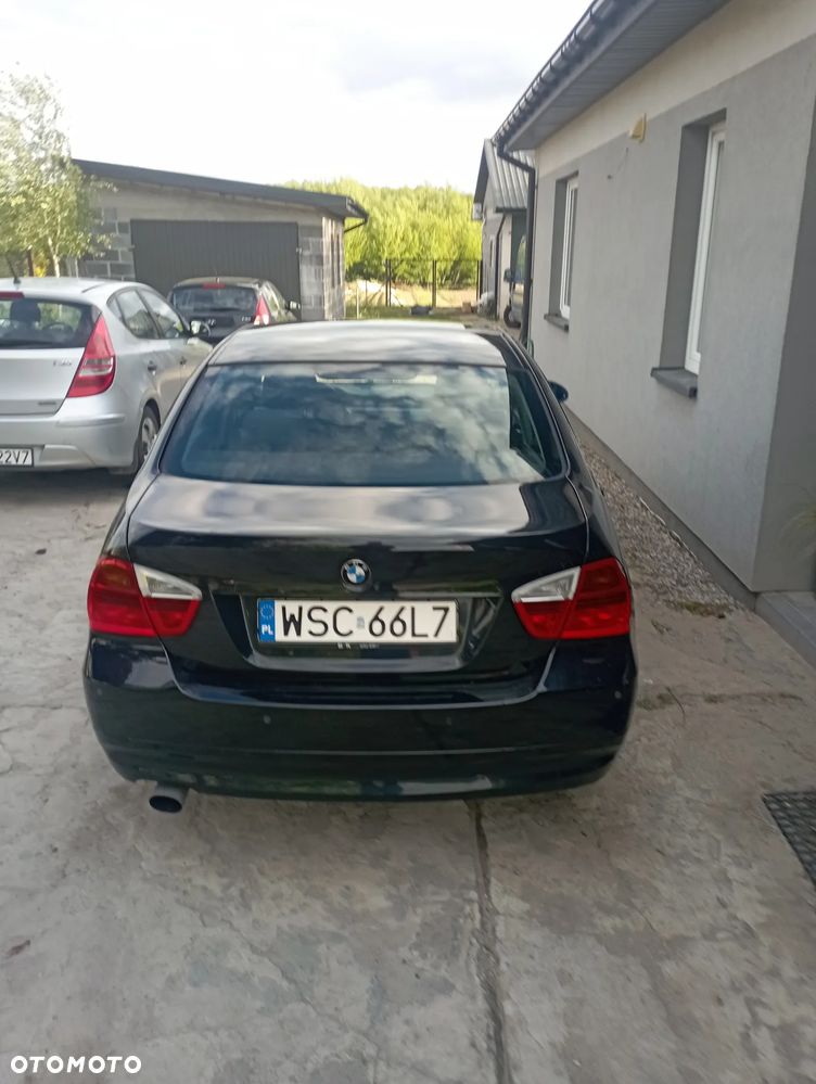 BMW E90 2006 photo 4