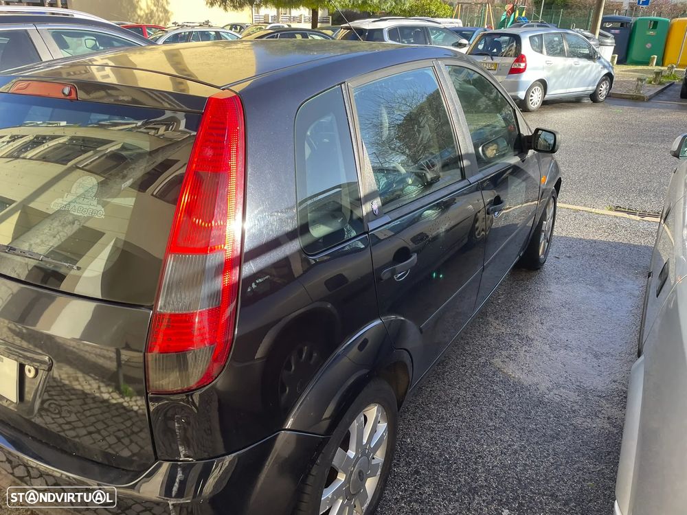 Ford Fiesta 1.25 Ghia - 9