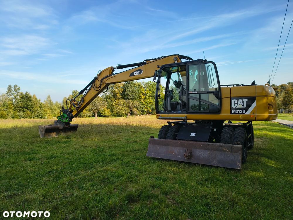 Caterpillar M313D - 14
