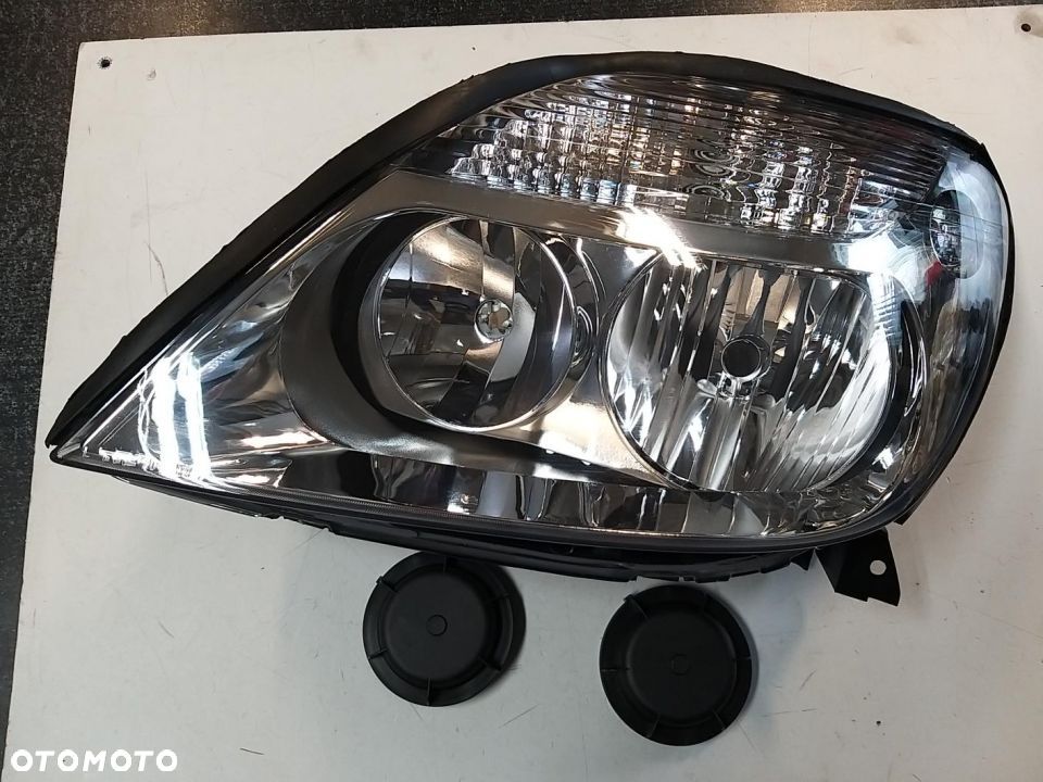 Reflektor Lewy  H1/H7, elektryczny, kolor wkładu: chromowany) RENAULT MEGANE SCENIC, SCENIC I - 1