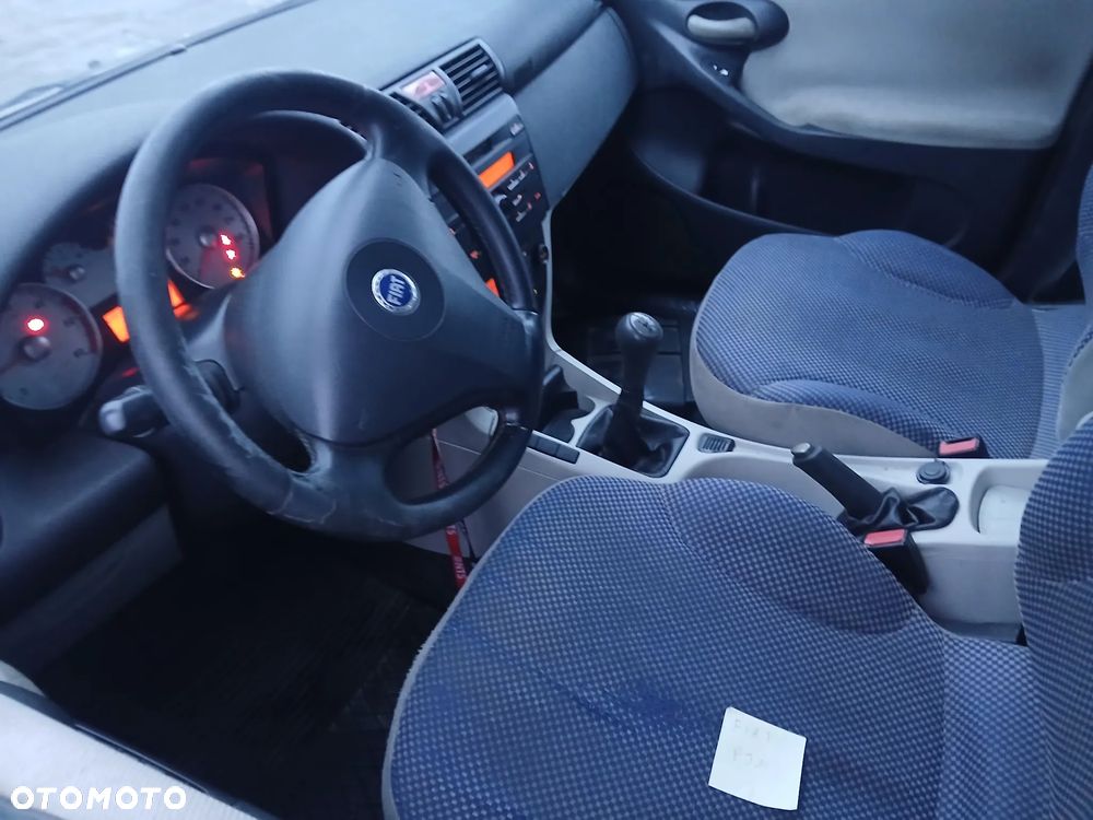 fiat stilo fotel kanapa deska kokpit podsufitka boczek podłokietnik licznik panel szyb stacyjka - 2