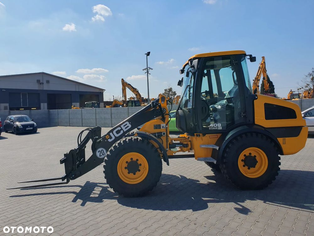 JCB 409 - 6