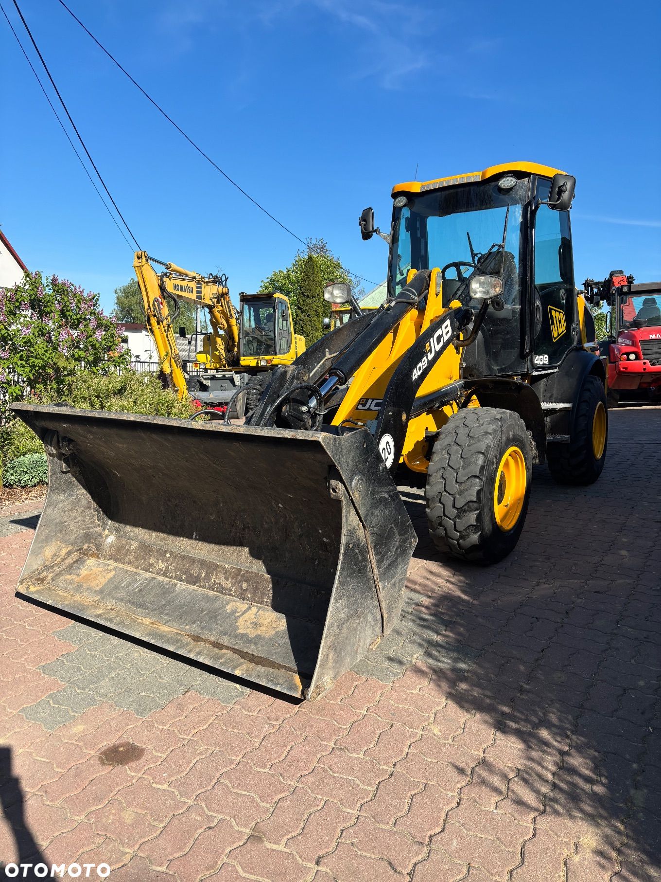 JCB 409 - 1