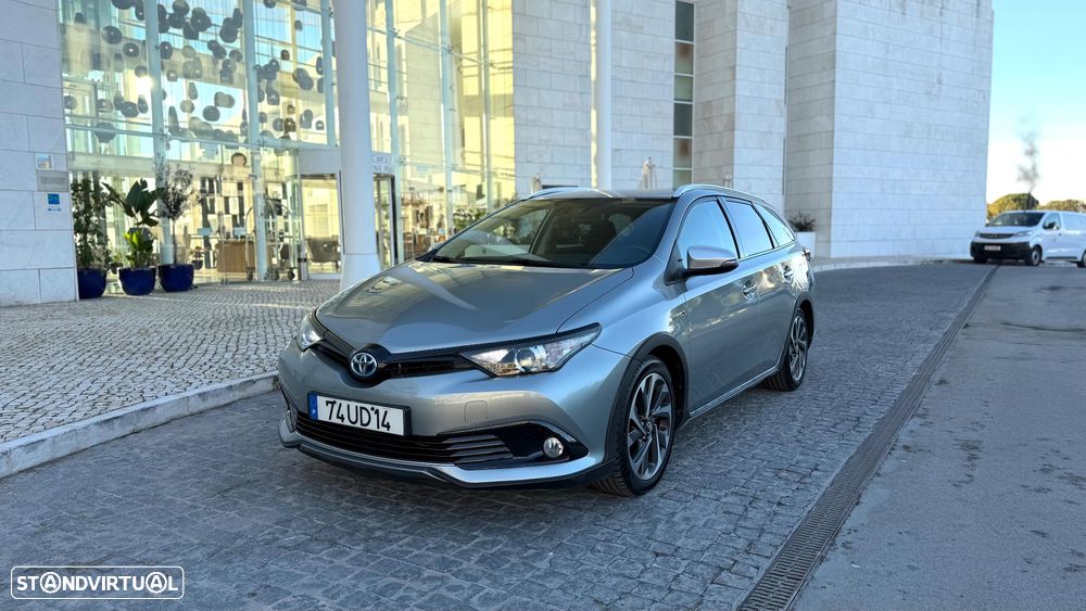 Toyota Auris Touring Sports 1.8 HSD Comfort +P.Techno+P.Sport - 1