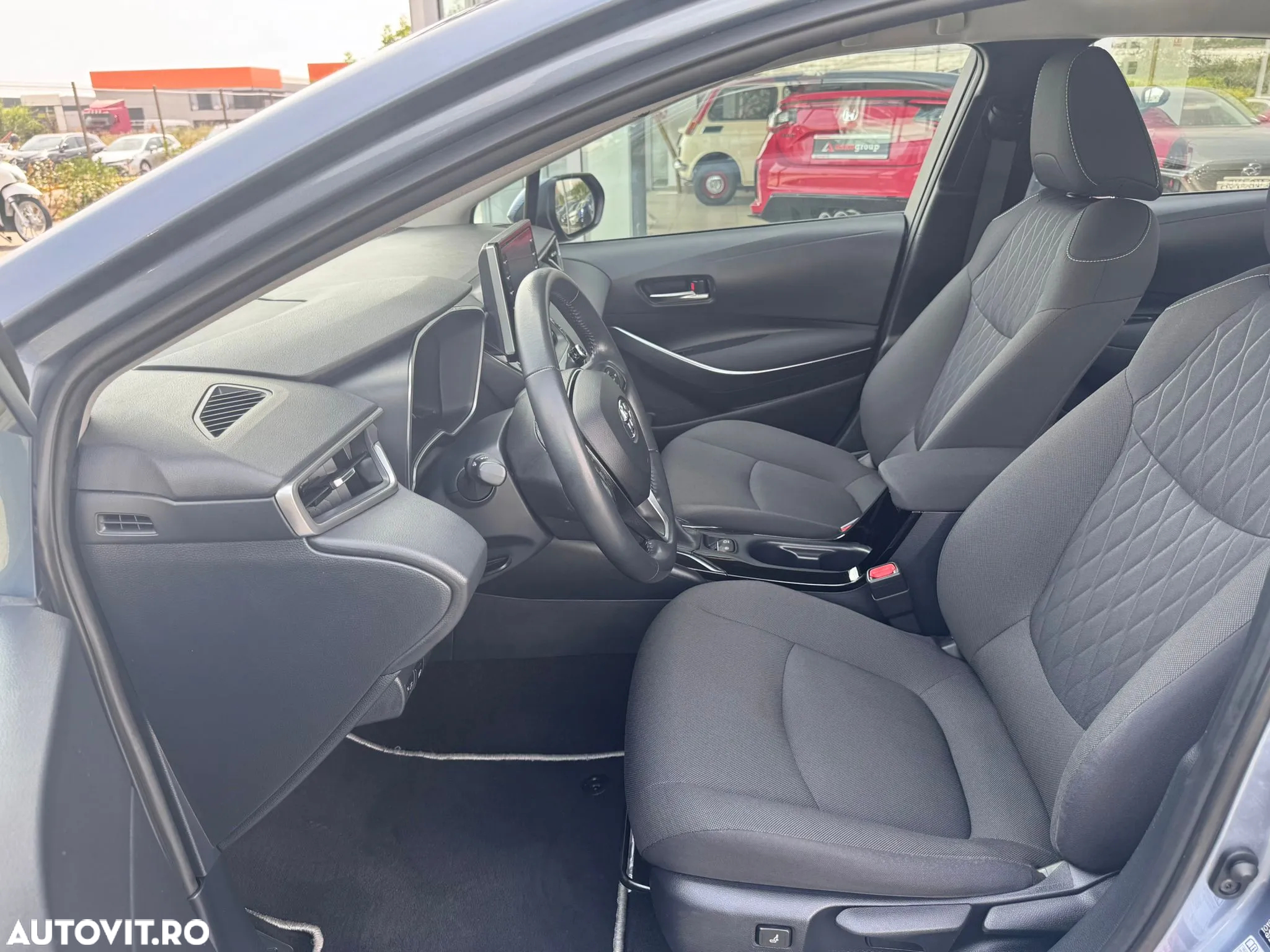 Toyota Corolla 1.8 HSD Business - 11