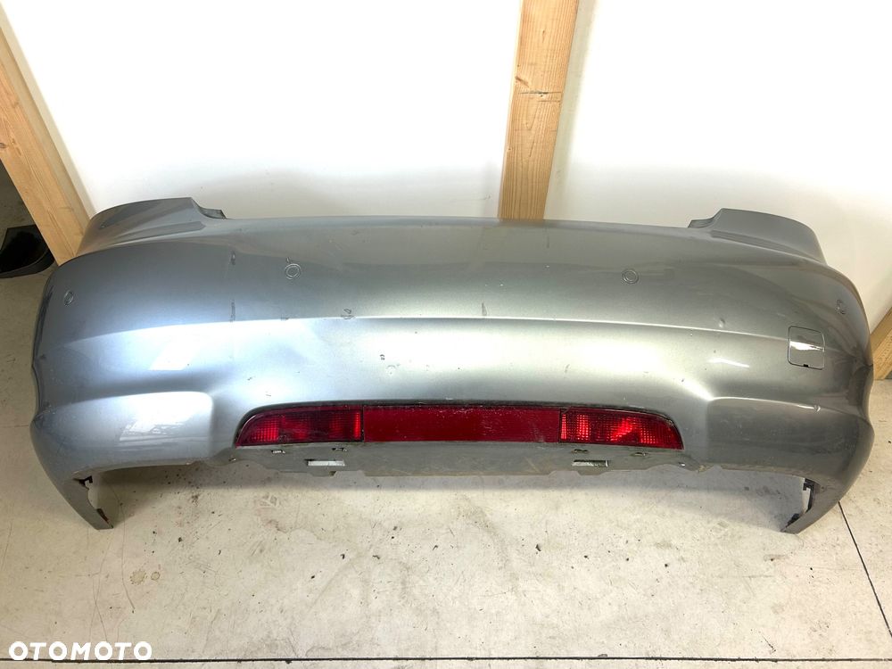 Saab 95 9-5 NG zderzak kompletny tylny tył 2010-2012 kolor 322 odblask przeciwmgłowe
