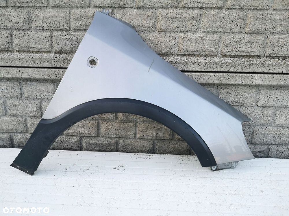 SKODA FABIA SCOUT 4X4 BŁOTNIK PRZEDNI PRAWY - 1