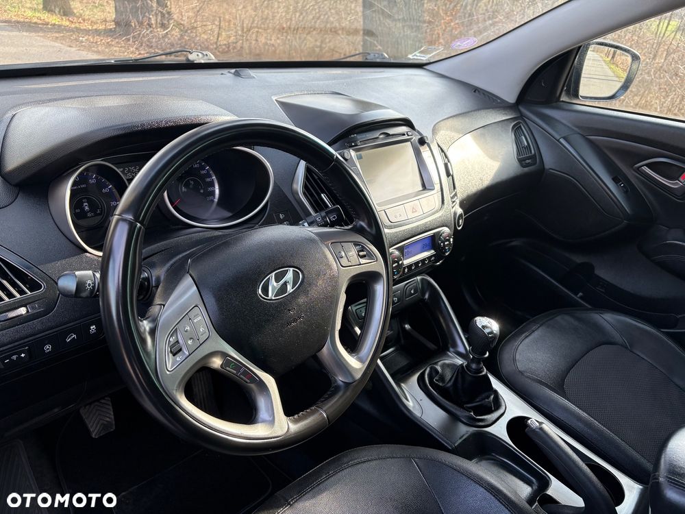 Hyundai ix35 blue 1.6 2WD Finale Gold - 13