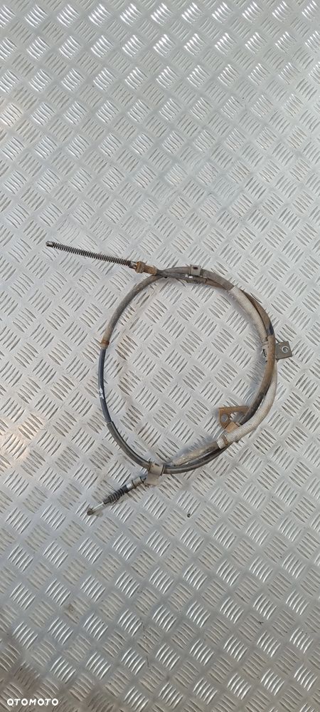 Mitsubishi L200 V 2.4 Linka Hamulca Ręcznego Prawy Tył - 1