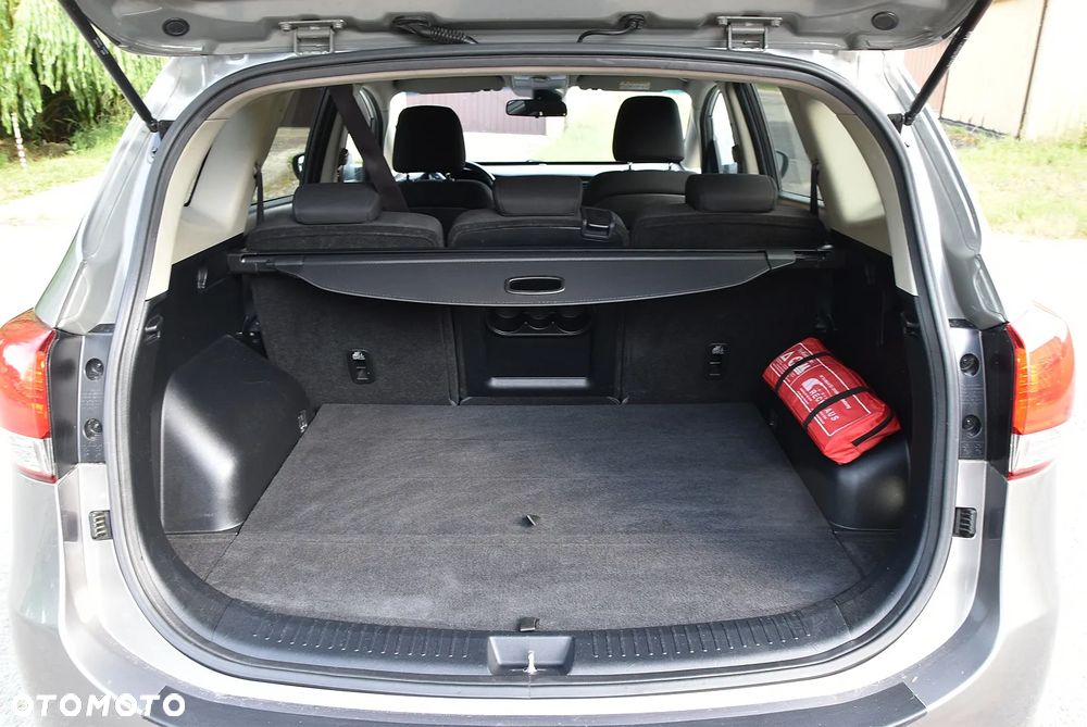 Kia Carens - 8