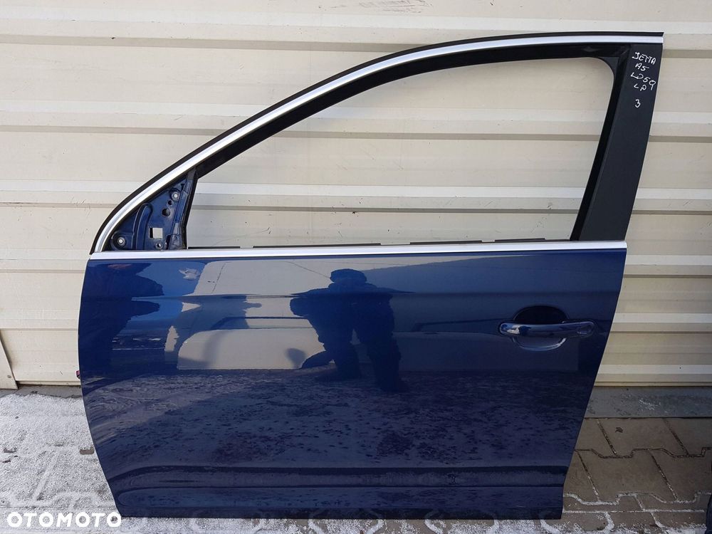 VW JETTA V 05-10r GOLF V KOMBI DRZWI LEWE PRZÓD PRZEDNIE LD5Q