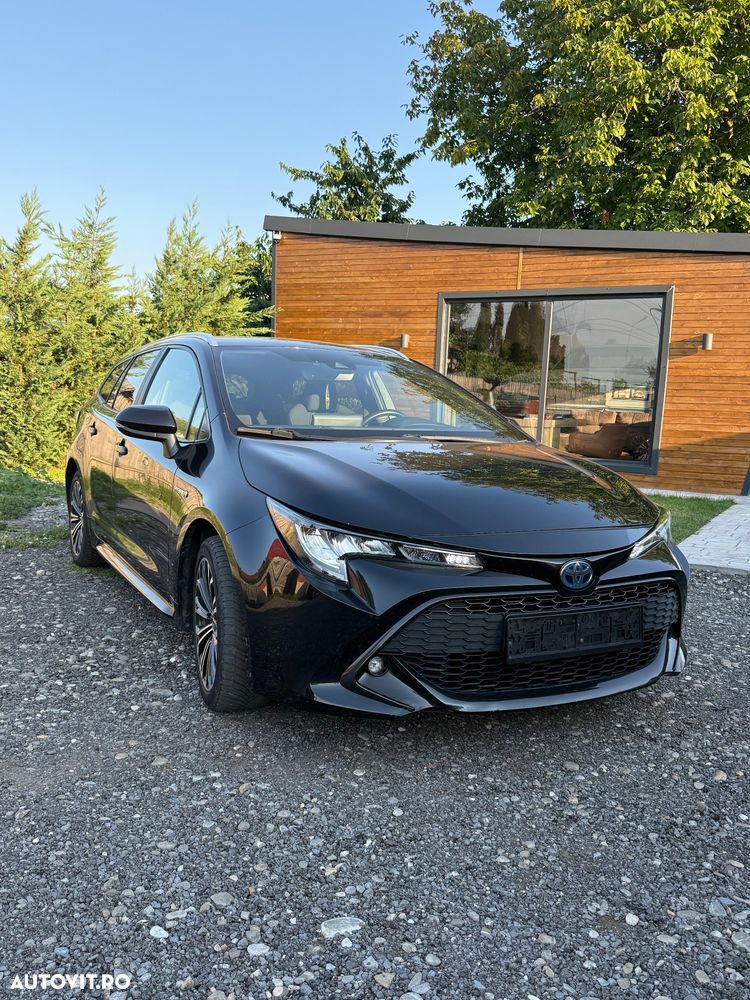 Toyota Corolla 1.8 HSD Business - 7