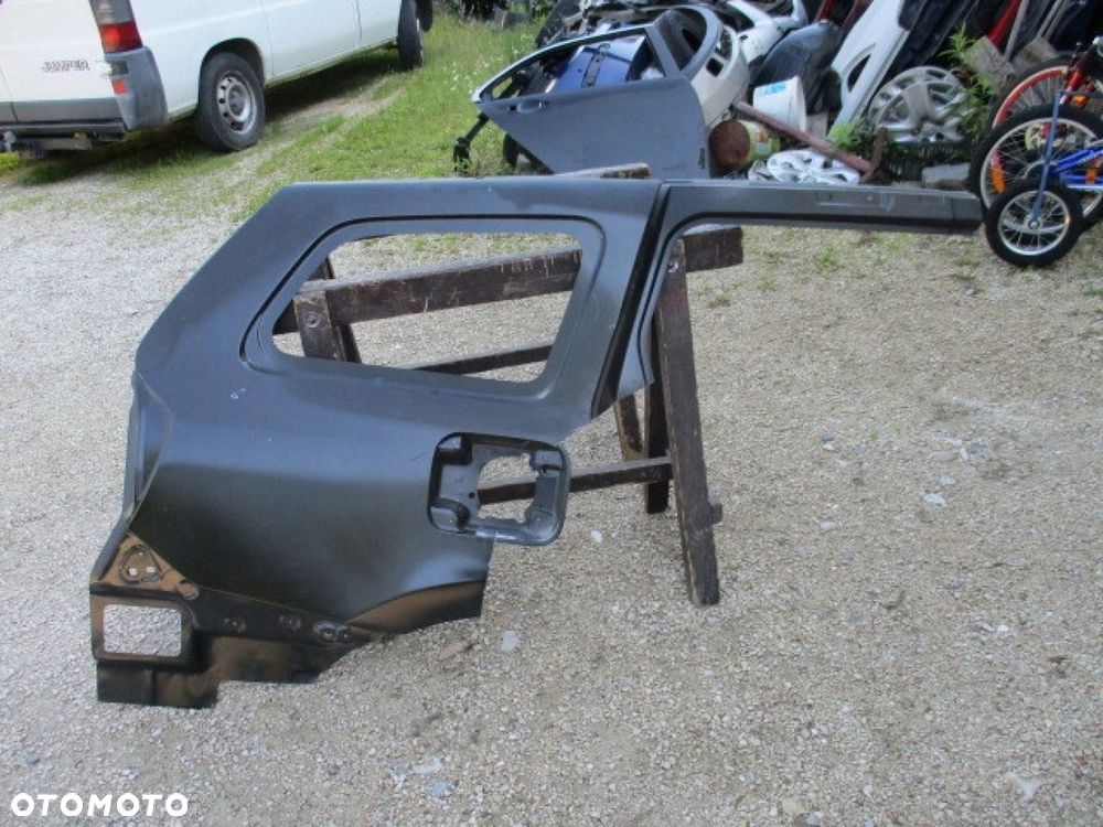 BŁOTNIK TYLNY PRAWY LOGAN II KOMBI MCV NOWY ORYG. - 1