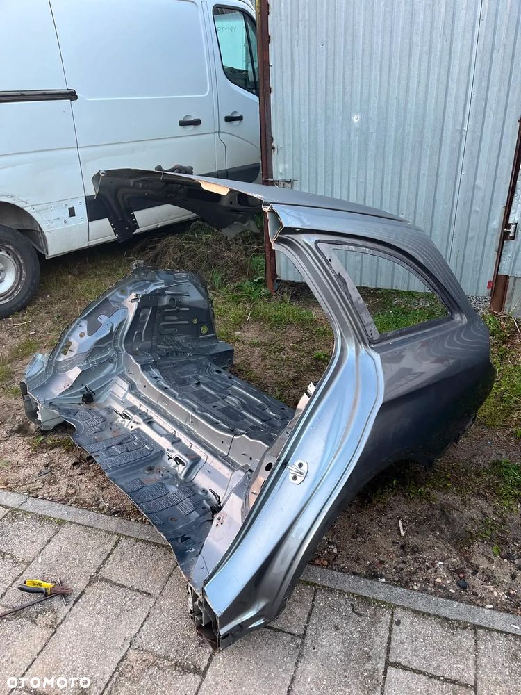 MERCEDES E KLASA W213 KOMBI BŁOTNIK ĆWIARTKA LEWA KOLOR 992