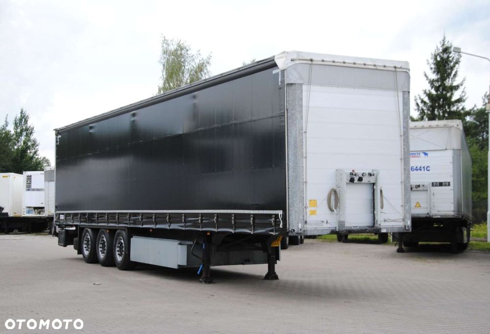 Schmitz Cargobull SCS kurtyna, podnoszona oś - 3
