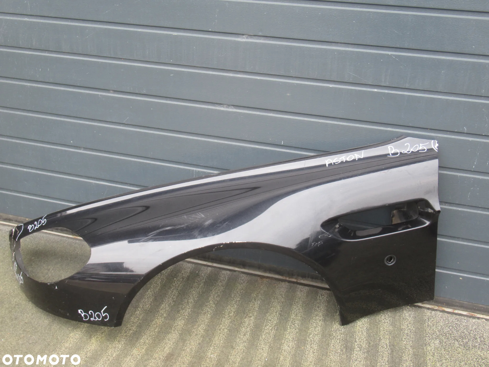 BŁOTNIK PRZEDNI PRZÓD PRAWY LEWY ASTON MARTIN VANTAGE V8 2005 - 12