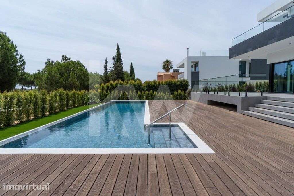 Moradia T4 nova com piscina e jardim junto do campo de Golfe em Vilamo - Grande imagem: 3/48