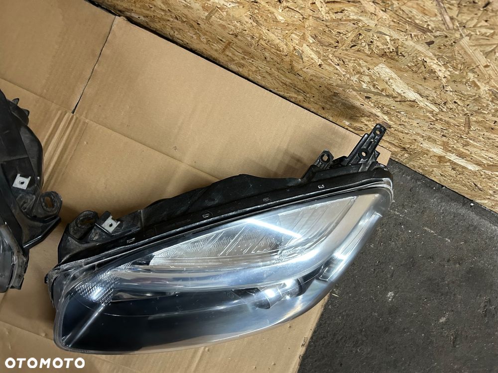 Renault Koleos I lift 2011- lampa lewy przód prawy przód europa soczewka - 8