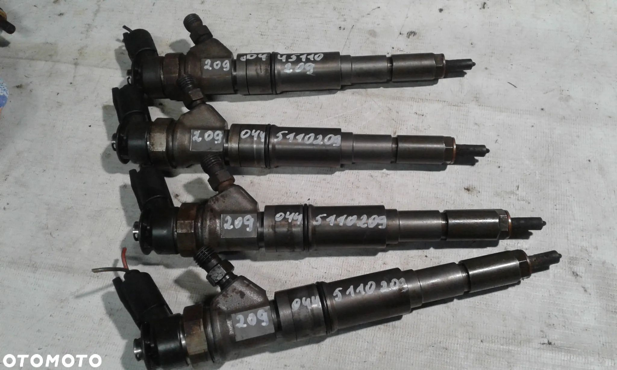 WTRYSKIWACZ BMW E46 318 d 0445110209 - 1