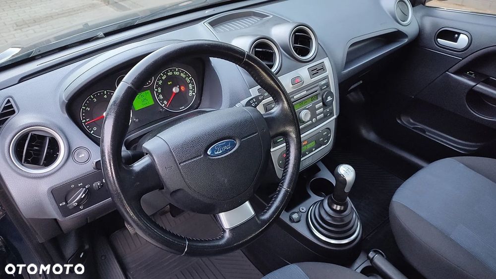 Ford Fiesta 1.4 Ghia - 4