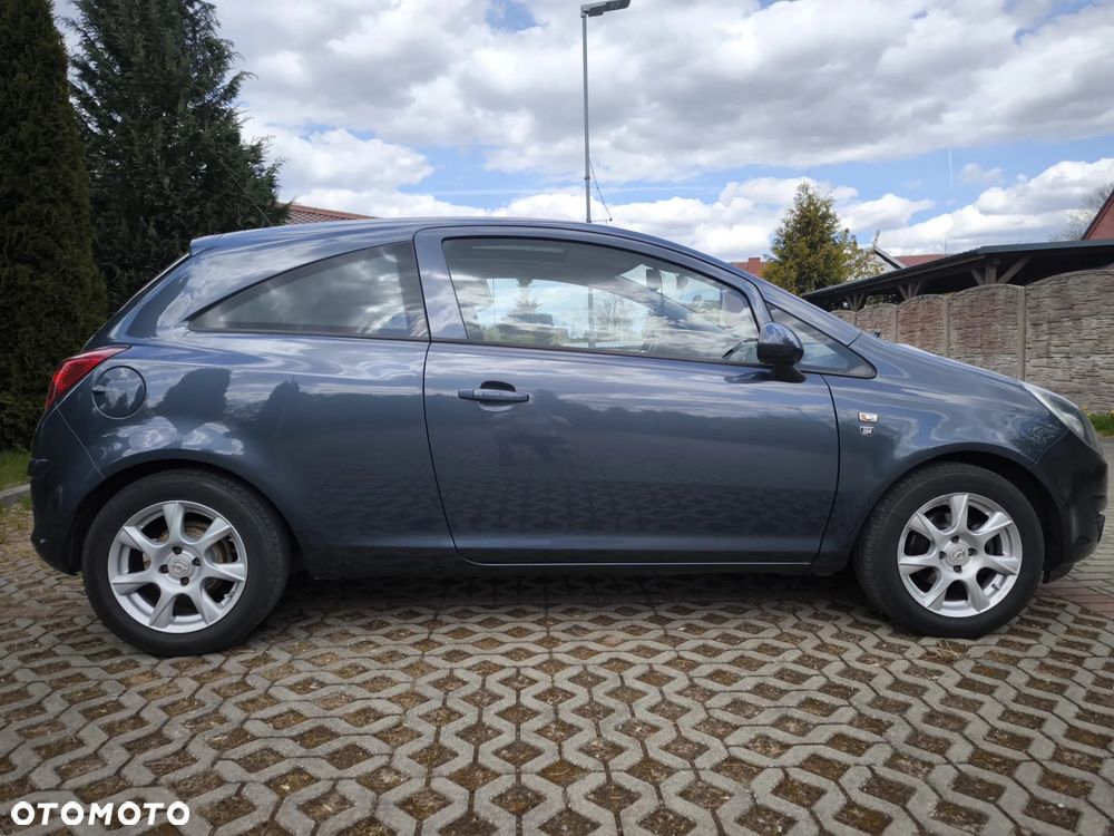 Opel Corsa 1.2 16V Cosmo - 7