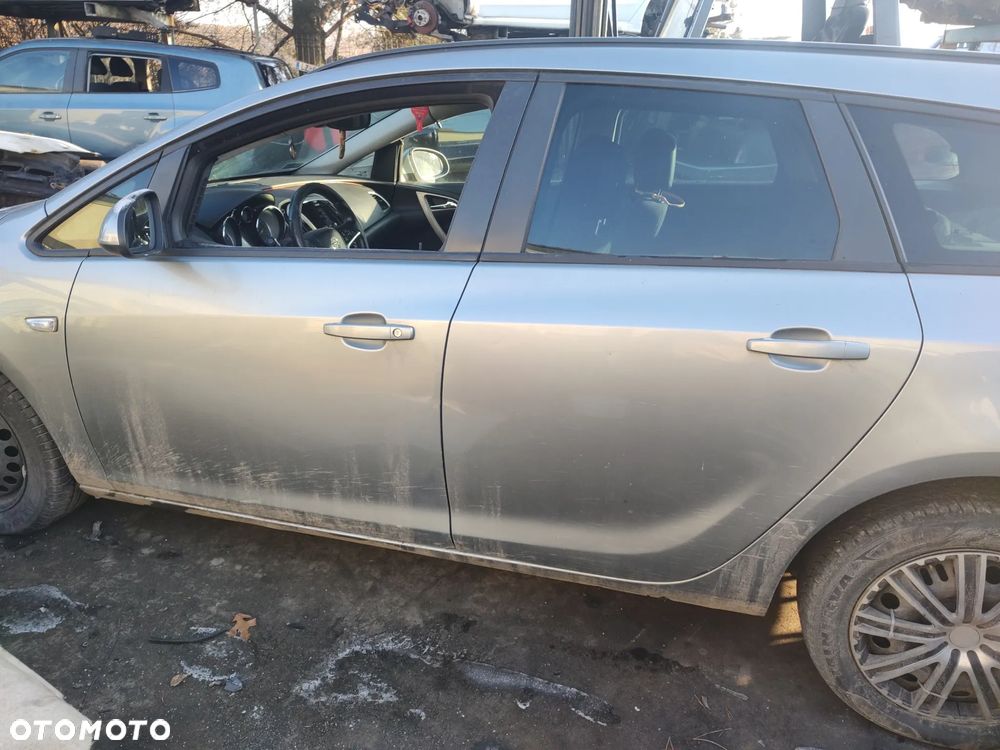 OPEL ASTRA J KOMBI PRÓG SŁUPEK LEWY PRAWY - 1
