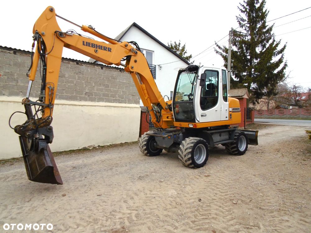 Liebherr 309 Litronic - 1