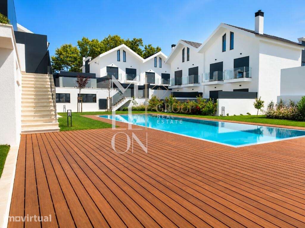 Moradia contemporânea com terraço e piscina em condomínio privado - Grande imagem: 2/19