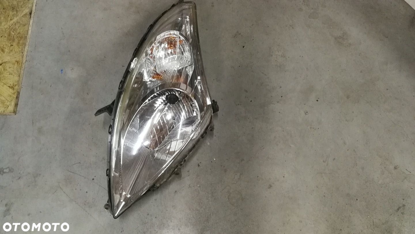 Lampa lewa przód przednia Suzuki Swift MK7 10-16 - 1