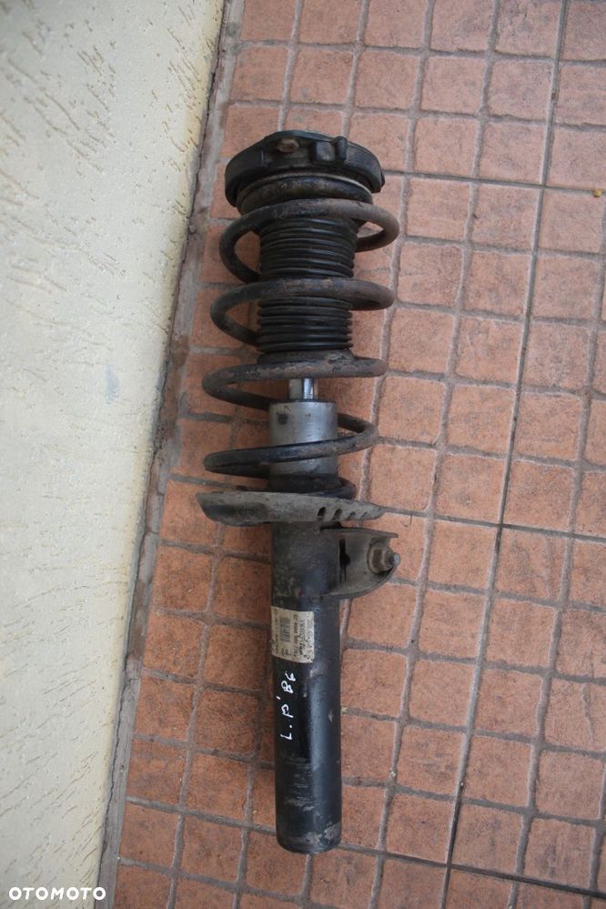 MCPHERSON AMORTYZATOR LEWY PRZÓD VW PASSAT B6 2.0 TDI 3C0413031N