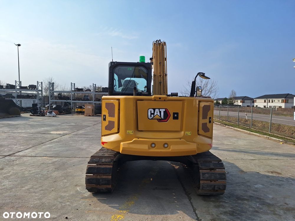 Caterpillar 310 - 5