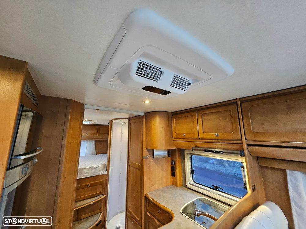 Rapido Le Randonneur 9097F CHASSI AL-KO Cama transversal + BASCULANTE - 38