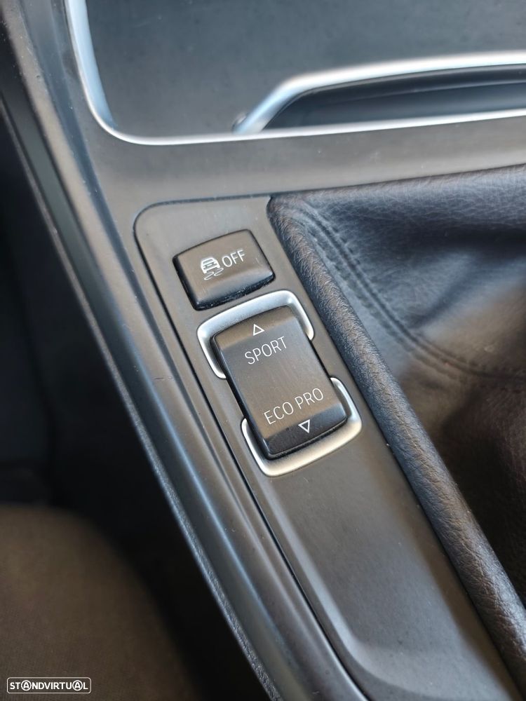 BMW 116 i Advantage — fotografia 14