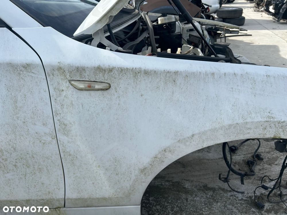 BŁOTNIK PRAWY PRZÓD BMW E87 - 3