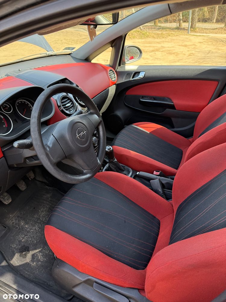 Opel Corsa 1.4 16V Enjoy - 11