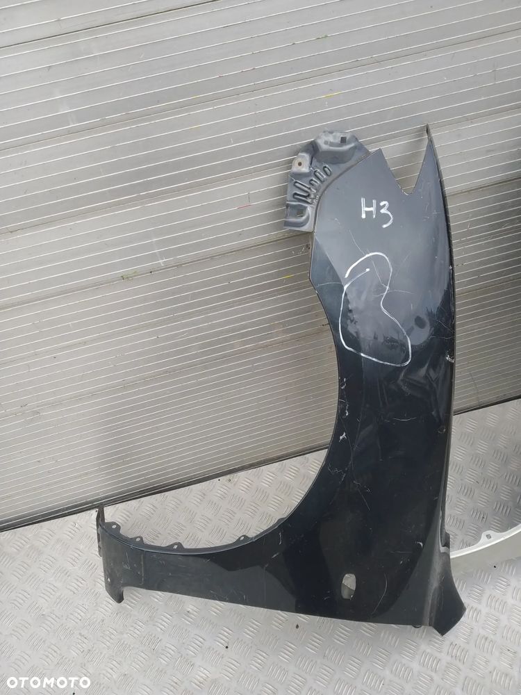 E763/F770/H3/H126/H131/H437/H438/H604 LEWY BŁOTNIK MAZDA 3 SEDAN - 4