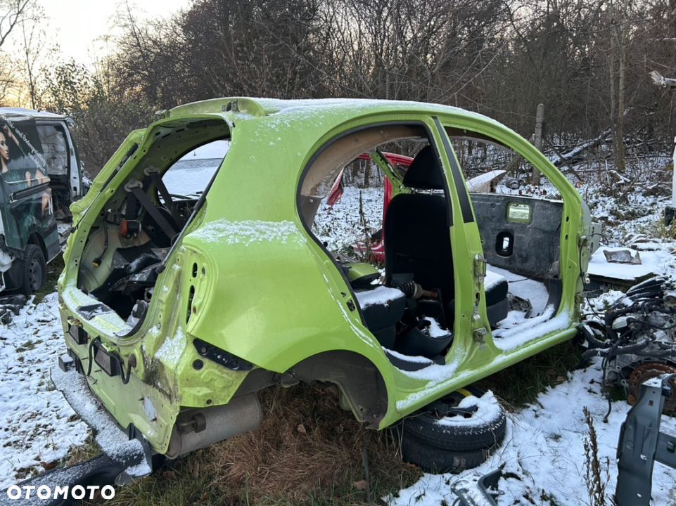 NISSAN MICRA K13 BLOTNIK PRAWY TYŁ PROG SŁUPEK - 1