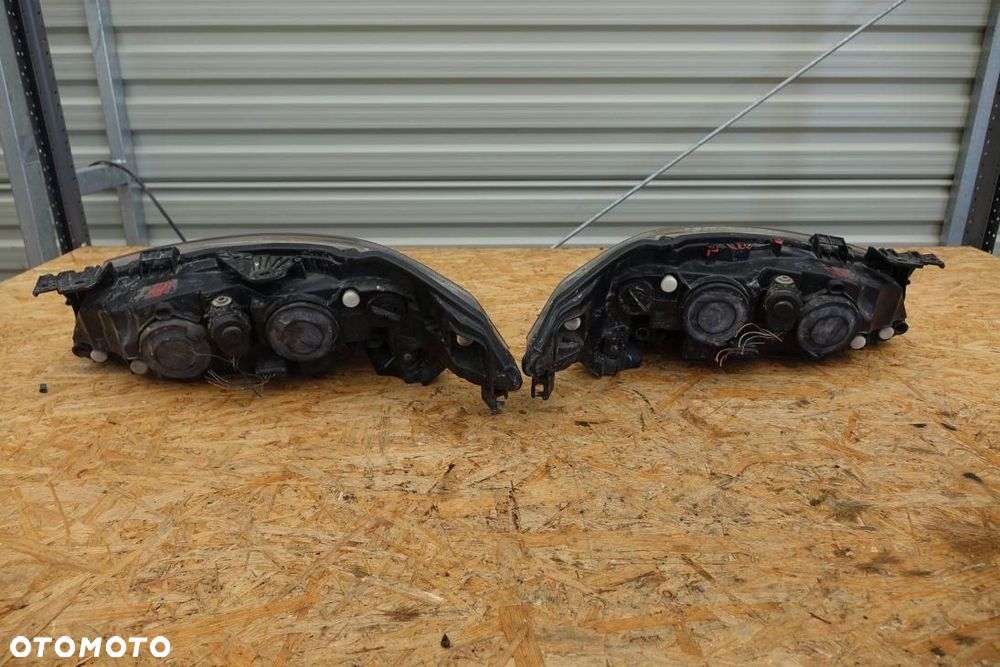 REFLEKTOR 2 LAMPY PRZÓD LEWA PRAWA EUROPA RENAULT LAGUNA II LIFT 42323423 - 9