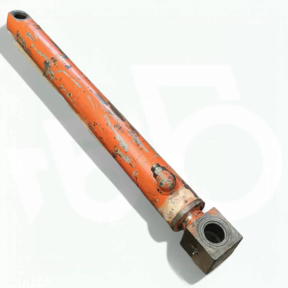 Siłownik poziomowania łyżki 85800911 New Holland LB 115 - 10