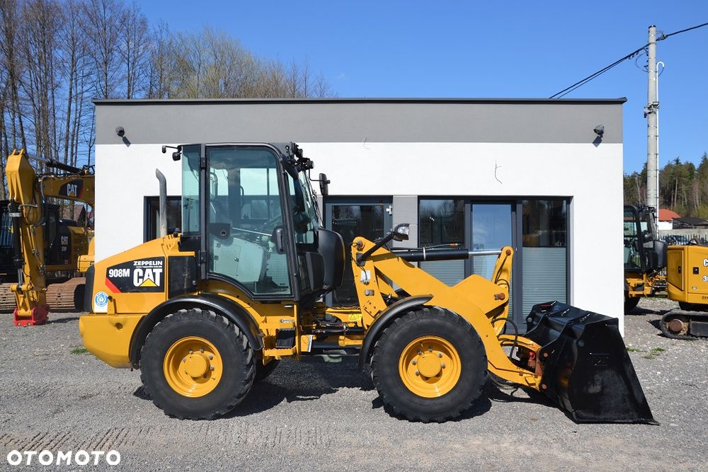 Caterpillar 908 M - 12