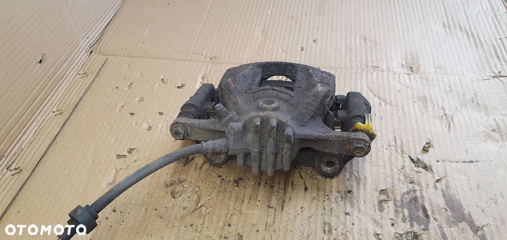 Zacisk hamulcowy lewy przód przedni lewy Opel Vivaro B Trafic III - 4