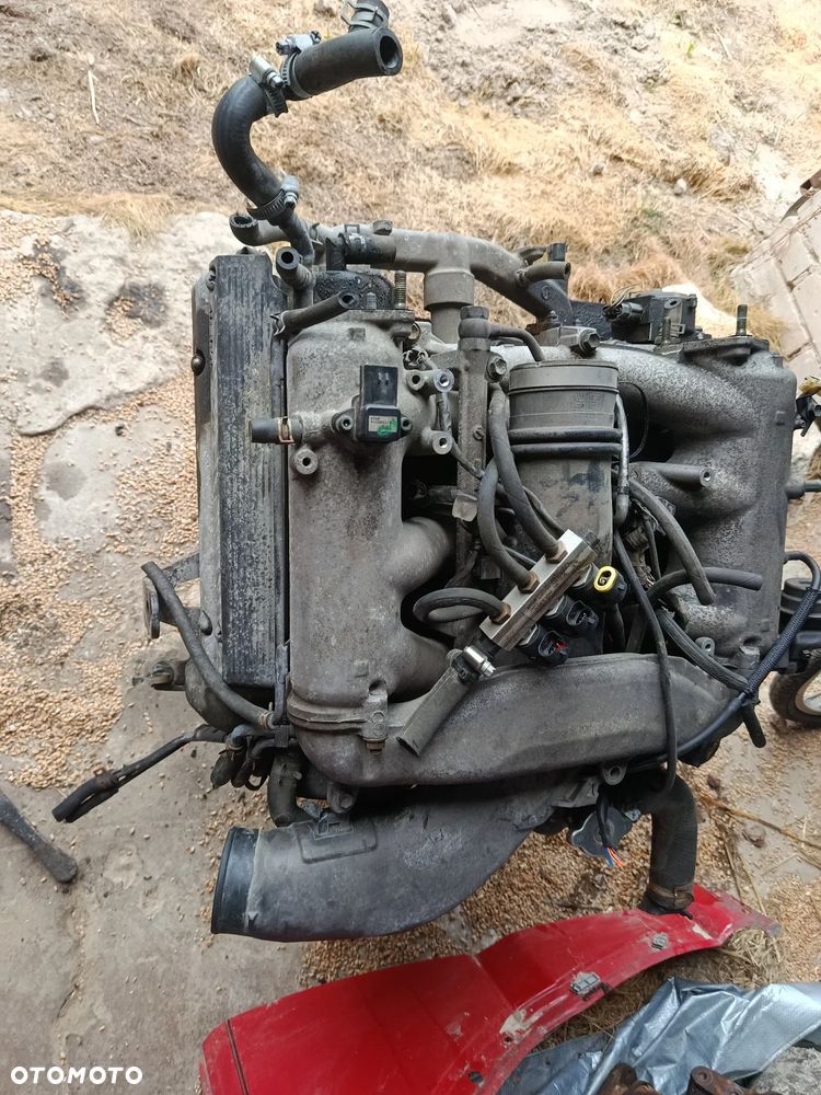 Silnik słupek Suzuki grand Vitara 1 2.7 v6 xl7 - 3